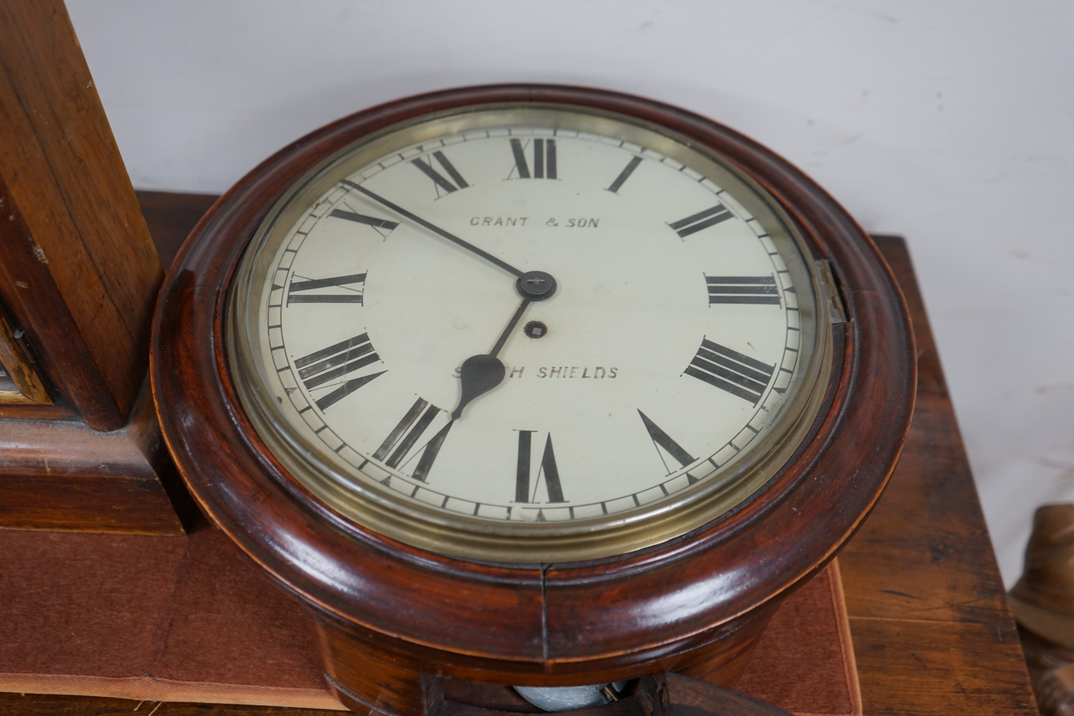 A Victorian mahogany circular wall dial with later movement, diameter 40cm together with an American shelf clock